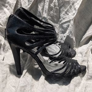 Sexy, strappy black faux python stiletto sandals